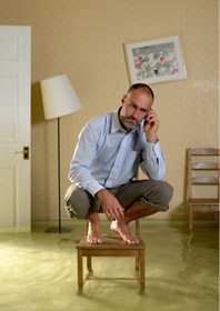 person in flooded house