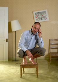 person in flooded house